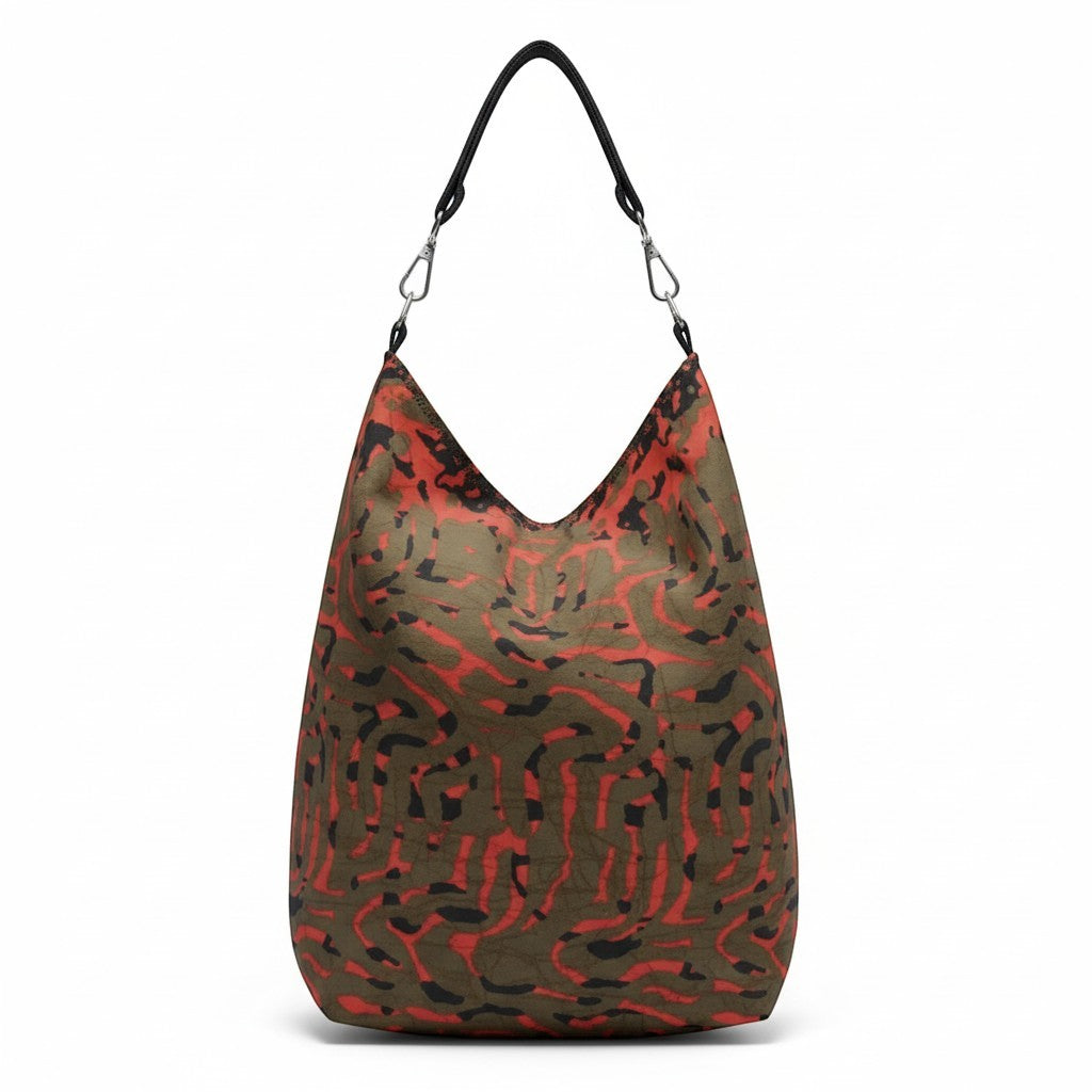 Big Bag Maker hobo shoulder bag with abstract red, olive green, and black print, black strap, and silver hardware.