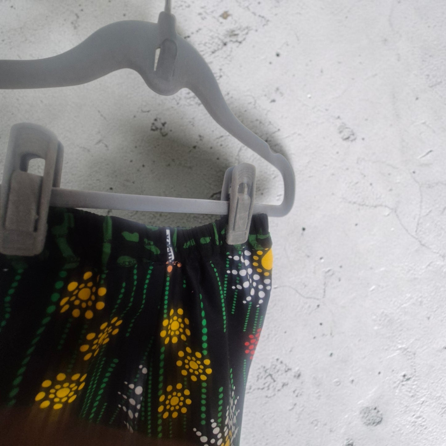 'Mud Huts & Dotty Flowers' African Print Trousers for Children