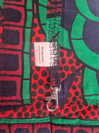 Close-up of the fabric key loop, silver-tone swivel clasp and Big Bag Maker label inside the Hibiscus & Sunflower bag.