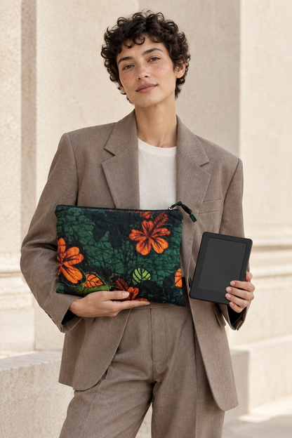 Gender-inclusive editorial portrait with botanical case and e-reader